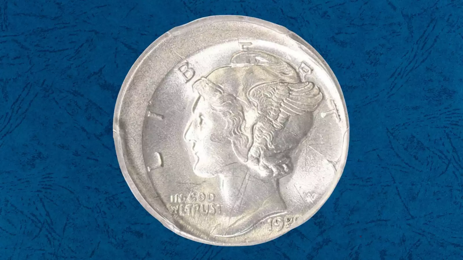 1920 Mercury dime off-center strike error showing design shifted from center with blank crescent of metal visible