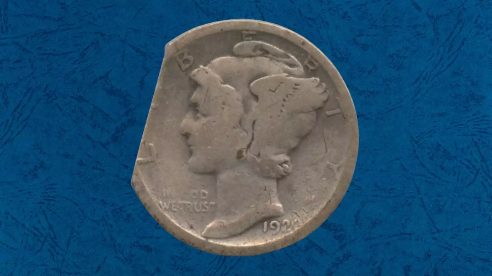 1920 Mercury dime clipped planchet error showing curved section missing from the coin's outer edge